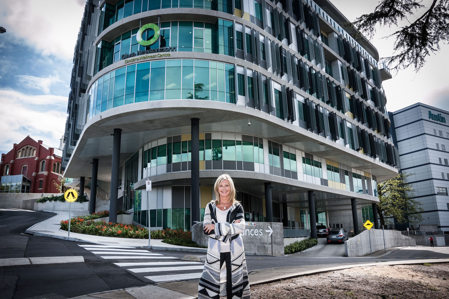 Olivia Newton-John stands outside of the Olivia Newton-John Cancer Wellness and Research Centre in the performer's hometown of Melbourne, Australia.