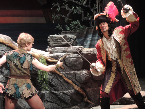 Peter Pan (Hayley Podschun) fights Captain Hook (John Bolton).