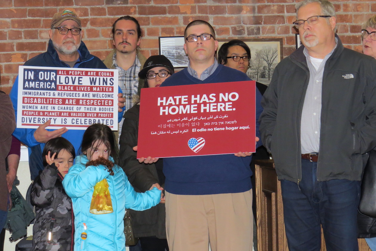 Almost three-dozen people attended Monday's Village Board work session to peacefully promote racial equality.