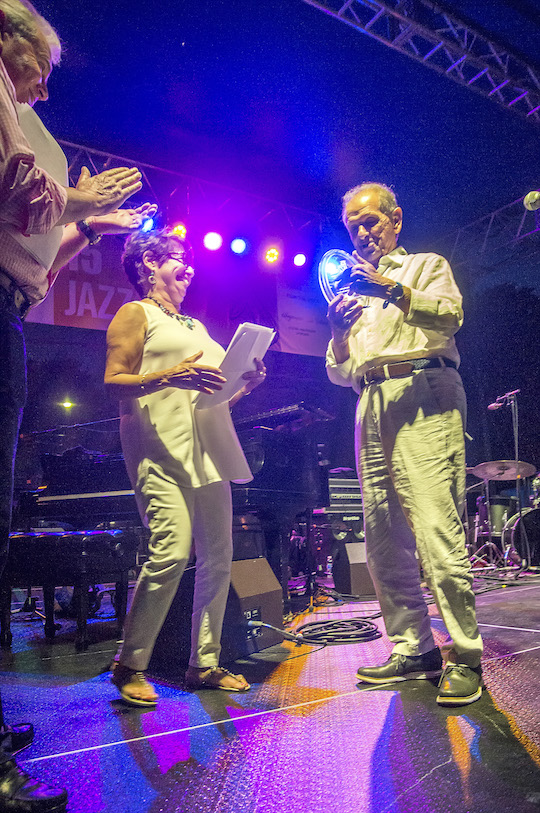 Richard Soluri receives an award.