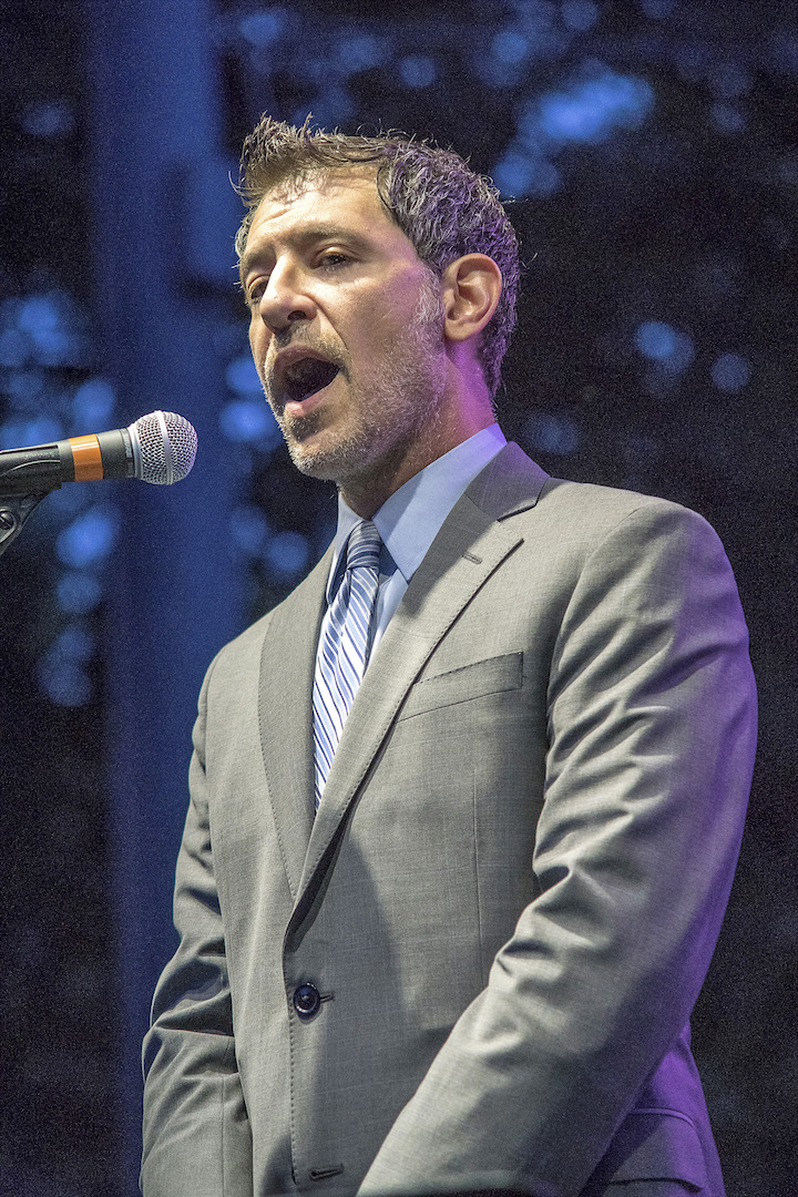 Tony Petrocelli sings the national anthem.