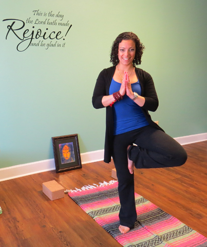 Annie Rychlik practices yoga at her Down Dog studio in Lewiston.