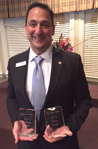 Fran Roach with awards.