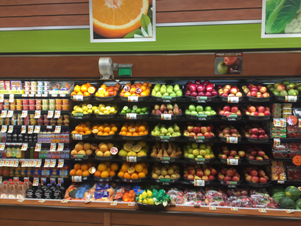 Tops Sanborn produce section and celebration cake.