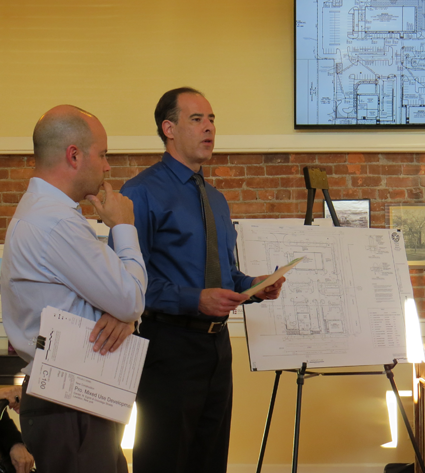 Sean Hopkins of Hopkins, Sorgi & Romanowski details the Ellicott Development plaza proposal as Engineer R. Christopher Wood of Carmina Wood Morris PC looks on.