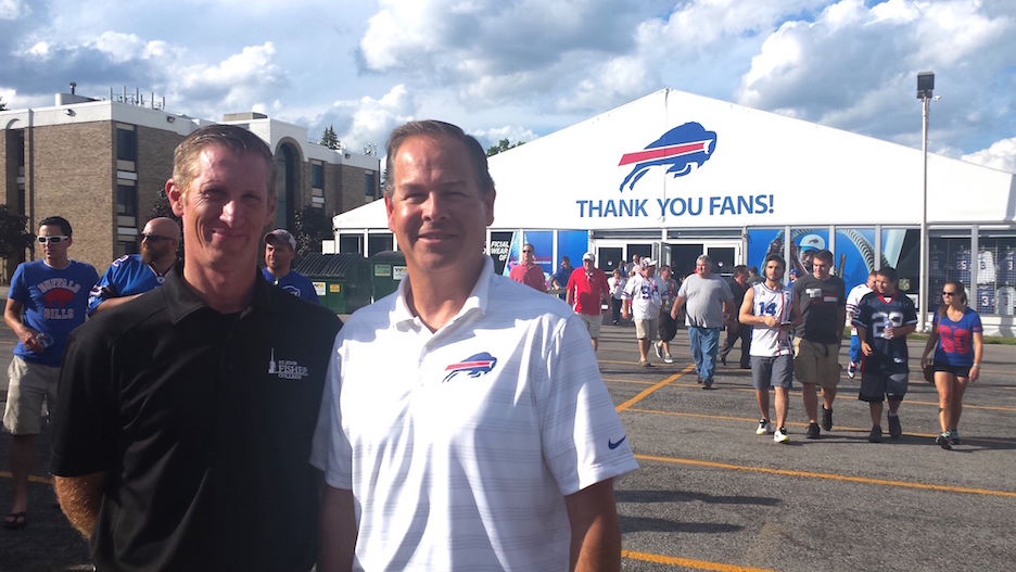Steve Salluzzo, St. John Fisher director of auxiliary services, left, and Andy Major, Bills vice president of operations and guest services.