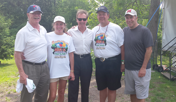 Pictured, from left: Phil Haberstro, executive director of the Wellness Institute; Debbie Billoni; Higgins; Mike Billoni; and Drew Cerza, the "Wing King" at the Food Bank's Walk Off Hunger.