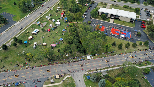 The Gus Macker 3-on-3 Tournament took place on Grand Island Boulevard from Whitehaven Road to Baseline Road Aug. 29 and 30, with three courts set up in the Grand Island Town Hall parking lot (upper right). Venders were also set up in the Town Commons. (Photo by K&D Action Photo and Aerial Imaging)
