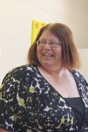 Island Presbyterian Church Pastor Carla Kline offers a blessing before the meal.