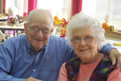 Don and Evelyn Lewis enjoy Thanksgiving dinner.