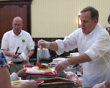 Lion Mark Frentzel dishes up the spaghetti Monday at Byblos Niagara Resort & Spa during the annual Lions Spaghetti Dinner fundraiser.