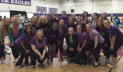 Alpha Sigma Alpha ladies show their support.