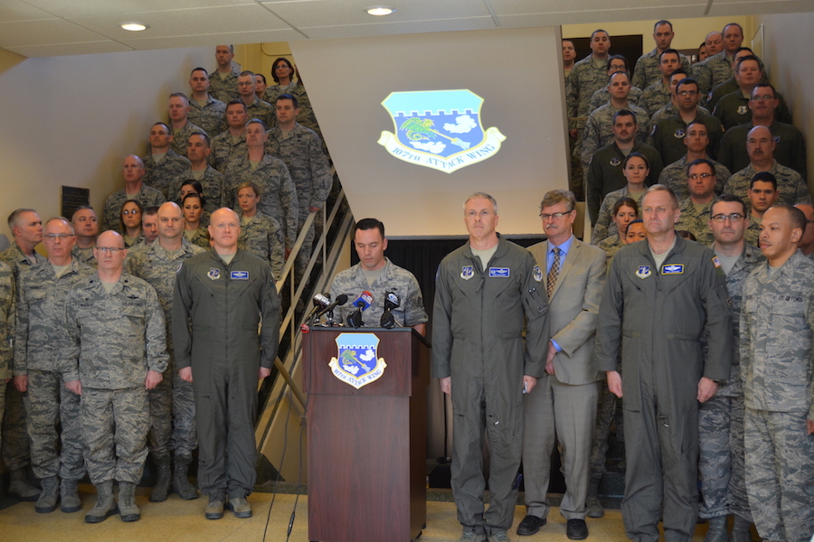 Tech. Sgt. Mark Dascomb reads the special order redesignating the 107th Airlift Wing as the 107th Attack Wing.