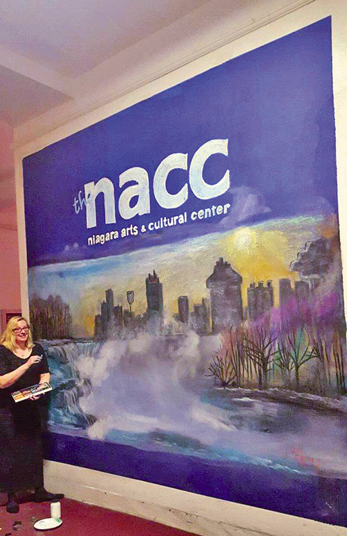 Artist Caedyn Metz works on her mural to be on display for the upcoming "Beyond the Barrel Art Exhibition." (Photo provided by the Niagara Arts and Cultural Center)