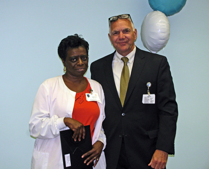 Brenda Dix Ferrell with Memorial President and CEO Joseph A. Ruffolo.
