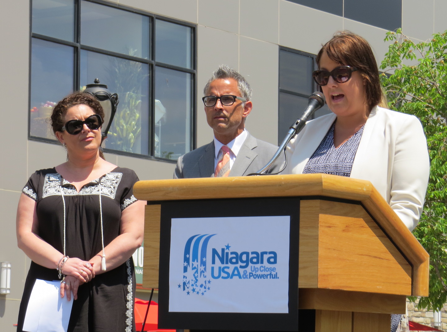 Susan Swiatkowski of Old Falls Street and the Downtown Niagara Falls Business Association, Jason Murgia of Old Falls Street and Claire Seveno of Hard Rock Cafe, Niagara Falls USA.