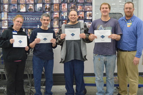 Jeff Dixon delivered certificates of participation to Colleen Hildebrant, James Van Auken, Brian McDonald and Jacob Farnham.