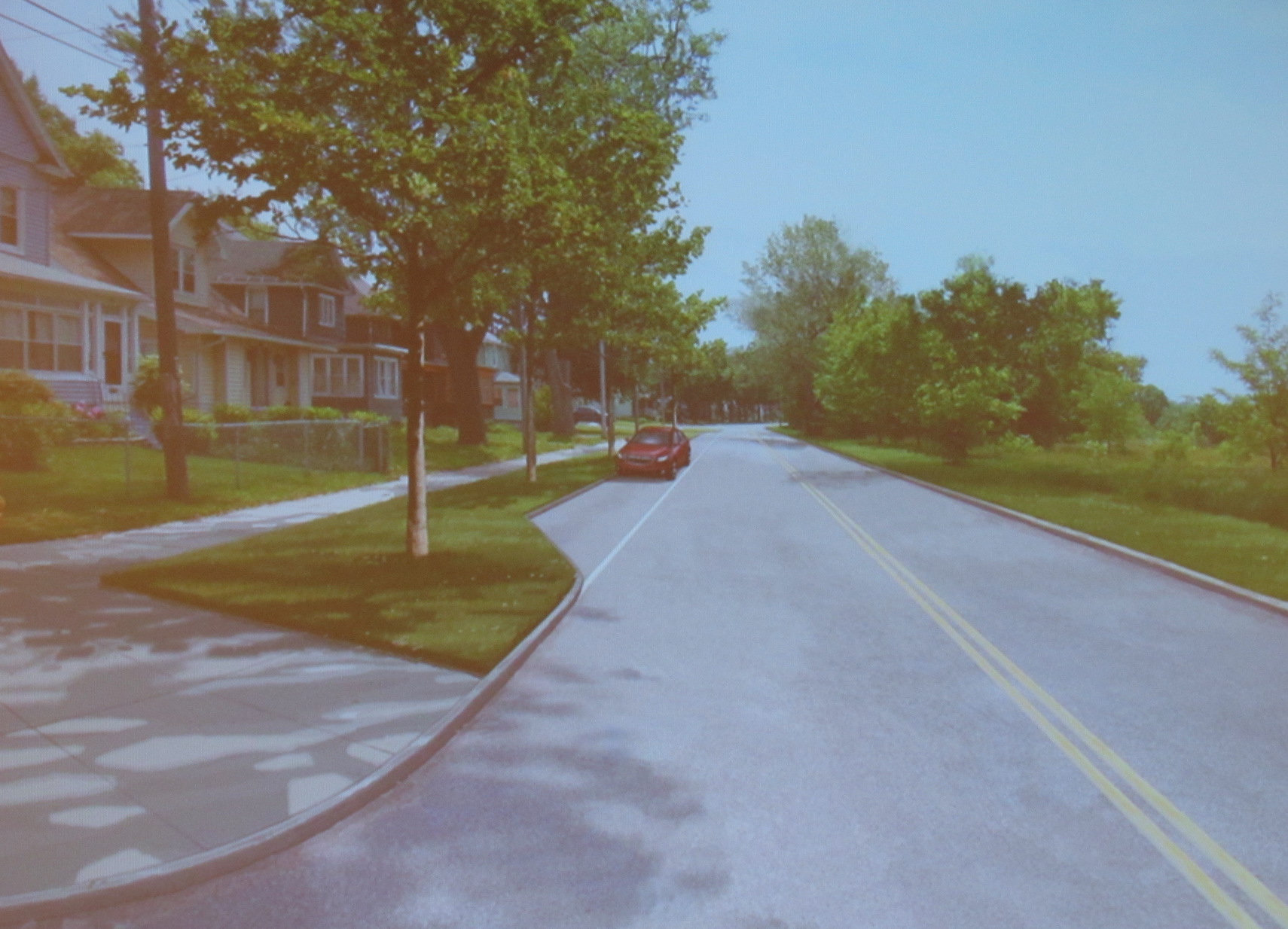 Two "after" images of Whirlpool Street.