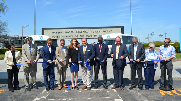 Community officials cut the ribbon to unveil the Discover Niagara Shuttle.