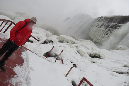 Will Gadd is pictured at the base of the Cave of the Winds in front of a less-frozen falls. (Photos by Joshua Maloni)