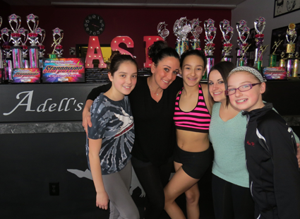 Adell Hoover Manarino works inside and outside the classroom with her students.