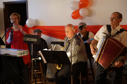 The Kathy Carr and Friend band performs traditional Polish music for eventgoers at Dom Polski. (Photos by Lauren Zaepfel)