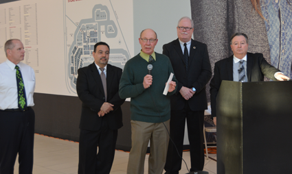 Former Town of Niagara Councilman Danny Sklarski (center) speaks about the donation tradition. From left: John Doran, senior manager of Macerich's Fashion Outlets of Niagara Falls, Town of Niagara Deputy Supervisor Charles F. Teixeira, Sklarski, Town of Niagara Councilman Marc Carpenter and Town of Niagara Supervisor Lee S. Wallace.