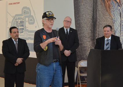 Post Commander Gary S. Zanardi of Veterans of Foreign Wars Lake Ontario Post 313 in Youngstown expresses his gratitude for a donation. From left: John Doran, senior manager of Macerich's Fashion Outlets of Niagara Falls, Town of Niagara Deputy Supervisor Charles F. Teixeira, Zanardi, Town of Niagara Councilman Marc Carpenter and Town of Niagara Supervisor Lee S. Wallace.