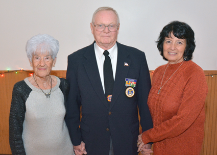 Local veterans and their families attend the dinner.