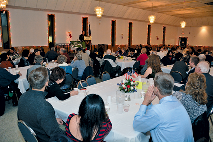 Lee Wallace addresses the crowd made up of local veterans and their loved ones at the Veterans Appreciation Dinner.