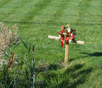Shown is a memorial near the location where teenagers lost their lives while walking along Shawnee Road at night. (Photo by Lauren Zaepfel)