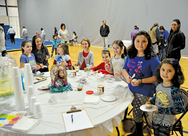 Children enjoy decorating cupcakes at last year's Winterfest.