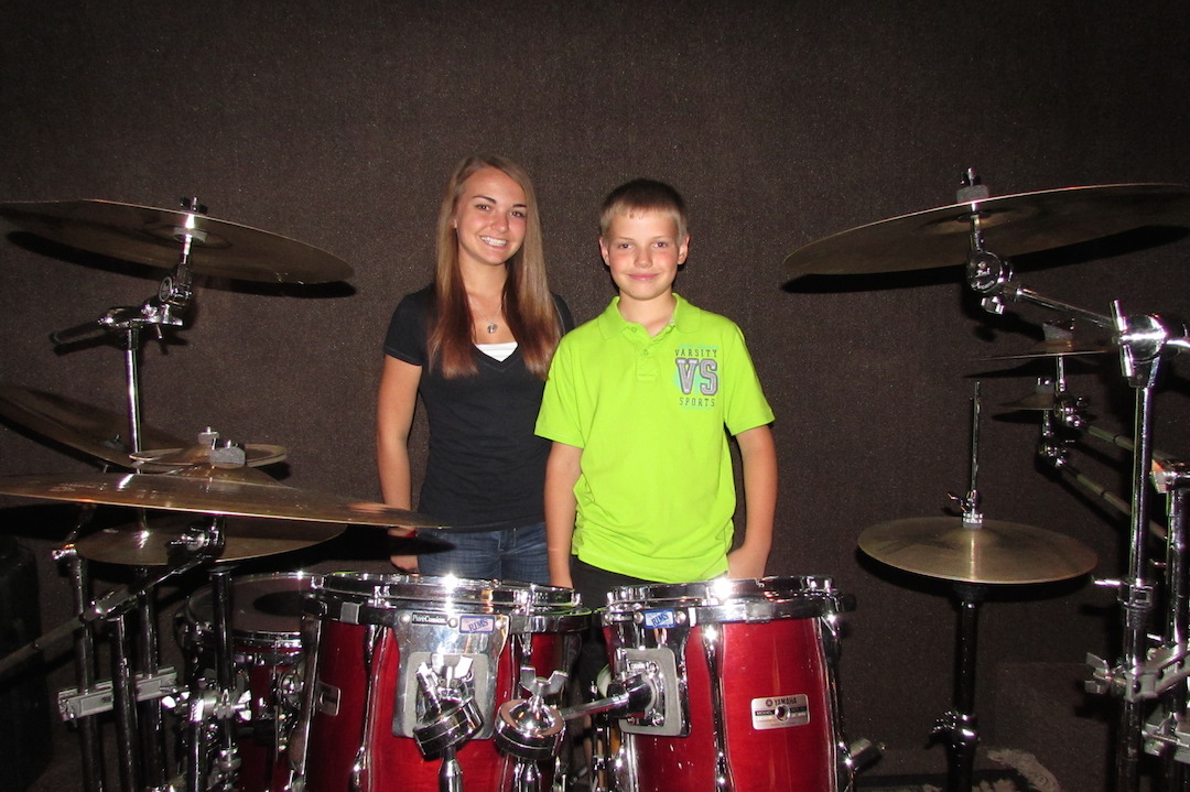 Bailey O'Riley's Village Pub namesakes - Bailey, 17, and Riley, 13 - stand in the new stage area, which is custom-built for performers.