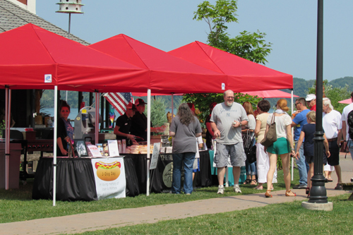 Silo patrons stand in line Monday ready to receive free hot dogs.