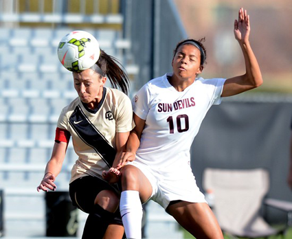 Jazmarie Mader goes in for a header against a component and nudges her off the ball.