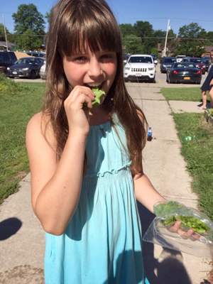 Sophia Patterson enjoys the fruits of her labor.